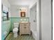 Classic bathroom with a vintage tile floor, a wooden mirror and a walk-in shower at 18906 Crescent Rd, Odessa, FL 33556