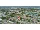 Aerial view showcasing the property with its convenient location near shopping and local attractions at 2166 Dixie Garden Loop, Holiday, FL 34690