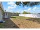 Expansive fenced backyard offers privacy and ample space for recreation at 2166 Dixie Garden Loop, Holiday, FL 34690