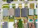 An aerial view shows the neat neighborhood, the symmetrical homes, and the well-maintained lawns at 2305 W Kentucky Ave, Tampa, FL 33607