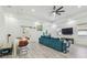 The living area features modern furniture, recessed lights, and access to the dining area at 2305 W Kentucky Ave, Tampa, FL 33607