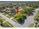 Aerial view of home showcasing its location on a tree-lined street at 2961 Stockwood Dr, Clearwater, FL 33761