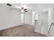 Bedroom upstairs features neutral carpet, and a ceiling fan at 30752 Veridian Way, Wesley Chapel, FL 33545