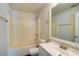 Well-lit bathroom featuring a shower-tub combo, a standard toilet, and a vanity at 3206 Shalimar Ter, North Port, FL 34286