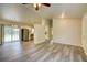 Open floor plan showcases stainless steel appliances and a sliding glass door at 3206 Shalimar Ter, North Port, FL 34286