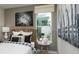 Cozy bedroom with a woven headboard, monochrome decor, and soft natural lighting at 3213 Lumber Falls Dr, Plant City, FL 33565