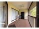 Spacious balcony with plenty of storage cabinets and shelves at 3540 Countrybrook Ln # 23, Palm Harbor, FL 34684