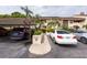 Townhouse parking spot showcases carport and building exterior at 3540 Countrybrook Ln # 23, Palm Harbor, FL 34684