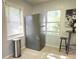 Kitchen area featuring stainless steel refrigerator, natural light, and neutral color scheme at 3545 7Th N Ave, St Petersburg, FL 33713