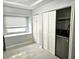 Laundry area featuring a modern washer and dryer neatly tucked behind folding closet doors at 3545 7Th N Ave, St Petersburg, FL 33713