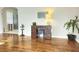 Bright living room featuring hardwood floors, a workspace nook, and neutral-toned walls at 3545 7Th N Ave, St Petersburg, FL 33713