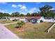 Charming corner lot home featuring a well-manicured lawn and landscaping at 412 W Jersey Ave, Brandon, FL 33510