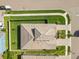Aerial view of a well-manicured property with a landscaped yard and driveway at 4365 Frontera Ln, Wesley Chapel, FL 33543