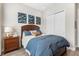 Comfortable bedroom featuring a Queen bed and a matching wood dresser at 4365 Frontera Ln, Wesley Chapel, FL 33543