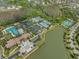 Community living with a pool, tennis courts, lake, and a clubhouse provide a luxurious lifestyle at 4365 Frontera Ln, Wesley Chapel, FL 33543