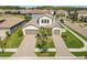 Beautiful home featuring a two-car garage and well-manicured landscaping and paver driveway at 4365 Frontera Ln, Wesley Chapel, FL 33543