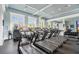 Bright gym with treadmills and weight machines, offering views and ample space for a complete workout at 4365 Frontera Ln, Wesley Chapel, FL 33543