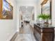 Bright hallway with wood flooring, elegant decor, and high ceilings at 4365 Frontera Ln, Wesley Chapel, FL 33543