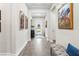Bright hallway with wood flooring, elegant decor, and high ceilings at 4365 Frontera Ln, Wesley Chapel, FL 33543