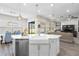 Spacious kitchen island overlooking dining and living areas at 4365 Frontera Ln, Wesley Chapel, FL 33543