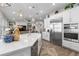 Modern kitchen with island and stainless steel appliances at 4365 Frontera Ln, Wesley Chapel, FL 33543