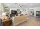 Cozy living room showcasing the hardwood floors and staircase at 4365 Frontera Ln, Wesley Chapel, FL 33543