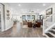Bright open-concept living room and staircase to the second floor at 4365 Frontera Ln, Wesley Chapel, FL 33543