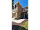 Comfortable townhome features a private entry, garage, and manicured front yard landscaping at 4535 Winding River Way, Land O Lakes, FL 34639