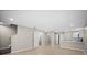 Open living space featuring new appliances and a bathroom nearby at 4535 Winding River Way, Land O Lakes, FL 34639