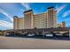 Spacious parking area underneath a building with multiple floors, convenient for residents and their vehicles at 4550 Cove Cir # 502, St Petersburg, FL 33708