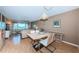 A stylish dining area flows into the living space, offering seamless entertainment possibilities at 4550 Cove Cir # 502, St Petersburg, FL 33708