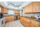 Kitchen features stainless steel appliances, granite countertops and light wood cabinets at 4550 Cove Cir # 502, St Petersburg, FL 33708