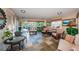 Comfortable lobby featuring tiled floor, seating and artwork to welcome you home at 4550 Cove Cir # 502, St Petersburg, FL 33708