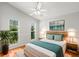 Inviting bedroom with hardwood floors, and bright natural light at 5269 White Sand Ne Cir, St Petersburg, FL 33703