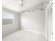 Neutral bedroom with carpet, a window, and a closet offering simple comfort at 5269 White Sand Ne Cir, St Petersburg, FL 33703