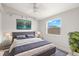 Relaxing bedroom with a comfortable queen bed, natural light and simple decor at 5269 White Sand Ne Cir, St Petersburg, FL 33703