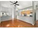 Updated kitchen with granite counters, wood floors, and an open layout at 5269 White Sand Ne Cir, St Petersburg, FL 33703