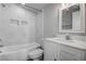 Modern bathroom featuring white marble tile in shower and white vanity sink at 5768 75Th N Ter, Pinellas Park, FL 33781