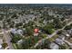 Aerial view of a neighborhood with mature trees near water at 627 38Th Ne Ave, St Petersburg, FL 33704