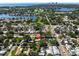 Scenic aerial view of a neighborhood near a lake and cityscape at 627 38Th Ne Ave, St Petersburg, FL 33704