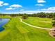 Expansive aerial view of the golf course, showcasing the lush greenery and scenic layout at 634 Poinsettia Rd, Belleair, FL 33756
