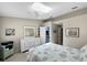 Bright bedroom with a skylight and a ceiling fan, creating a comfortable and airy atmosphere at 7508 Hollowell Dr, Tampa, FL 33615