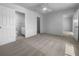 Large carpeted main bedroom featuring entryways to the main bathroom and walk-in closet at 804 Pineland Ave, Venice, FL 34285