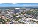 Panoramic aerial view showcases a vibrant cityscape with modern townhomes and a distant stadium at 813 Burlington N Ave, St Petersburg, FL 33701