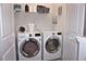 Functional laundry room with modern appliances and plenty of space at 813 Burlington N Ave, St Petersburg, FL 33701