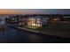 This spacious home boasts an inground pool, waterfront views, and lush landscaping for relaxed living at 90 Martinique Ave, Tampa, FL 33606
