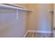Spacious walk-in closet with ample storage and neutral paint tones is great for organizing your wardrobe at 9481 Highland Oak Dr # 1206, Tampa, FL 33647
