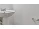 Pedestal sink in bathroom with tile flooring at 10418 Cross River Trl, Parrish, FL 34219