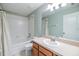 Bathroom features a shower and tub combo, and a vanity at 10906 Keys Gate Dr, Riverview, FL 33579