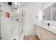 Modern bathroom with a marble walk-in shower and a sleek vanity at 11602 Innfields Dr, Odessa, FL 33556
